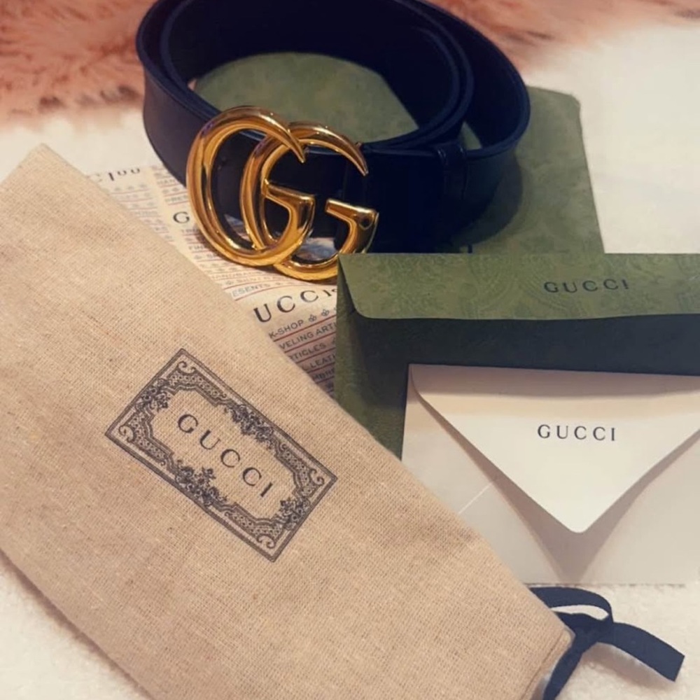 Gucci Black and Gold Leather Belt with Iconic GG Buckle